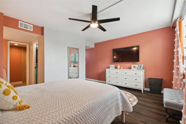 bedroom featuring dark wood-type flooring and ceiling fan