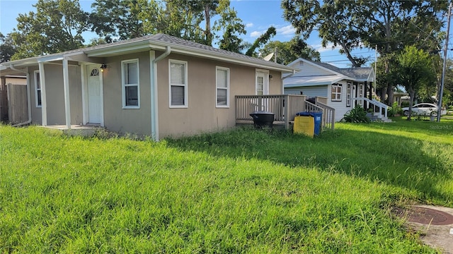 view of home's exterior featuring a yard