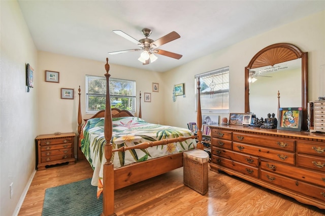 bedroom featuring light hardwood / wood-style flooring and ceiling fan