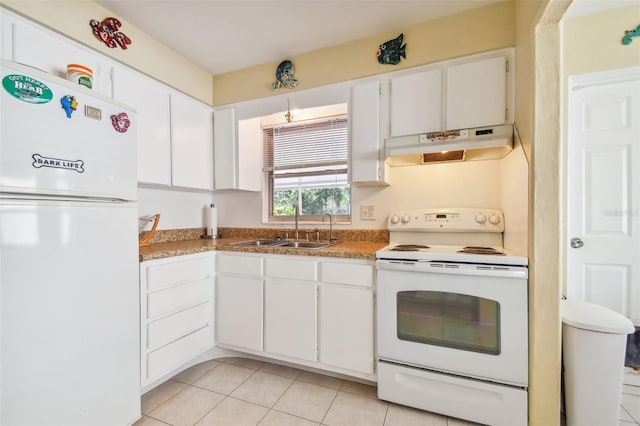 kitchen featuring white cabinetry, sink, light tile patterned floors, and white appliances