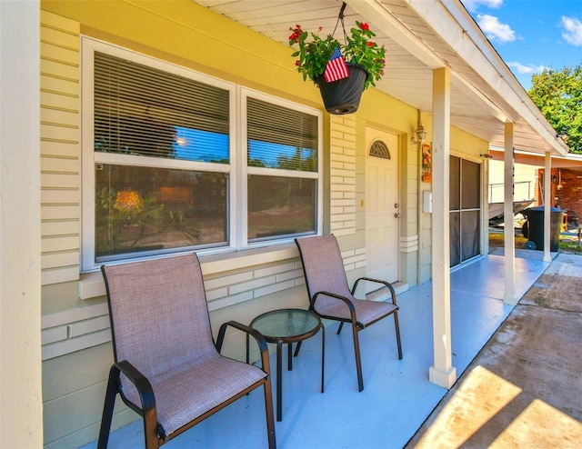 view of patio featuring a porch