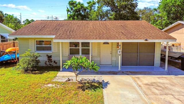 view of front of home featuring a porch and a front yard