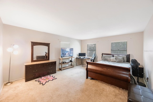bedroom with light carpet