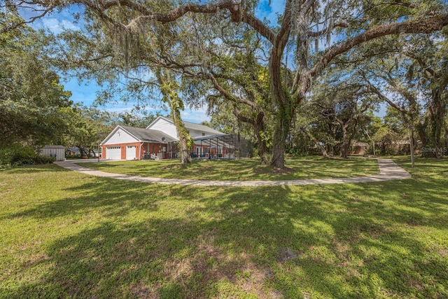 view of yard with a garage