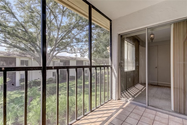 unfurnished sunroom featuring a wealth of natural light