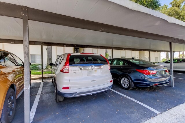 view of car parking with a carport