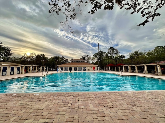 view of swimming pool featuring a patio area