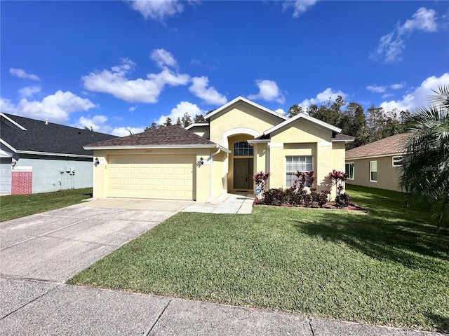 ranch-style home featuring a front lawn and a garage