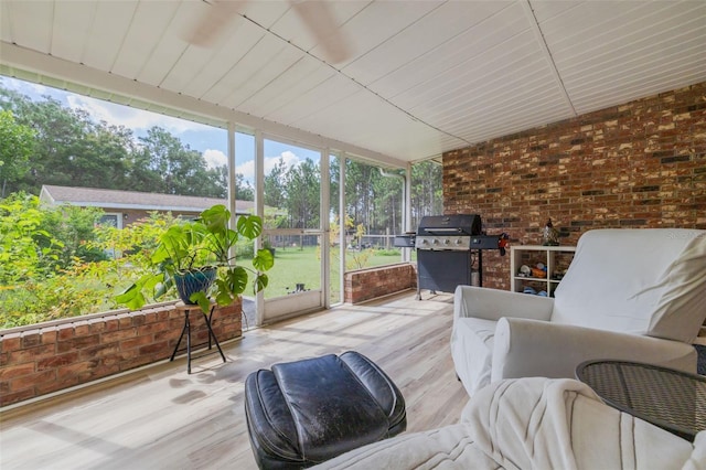 sunroom / solarium with a wealth of natural light