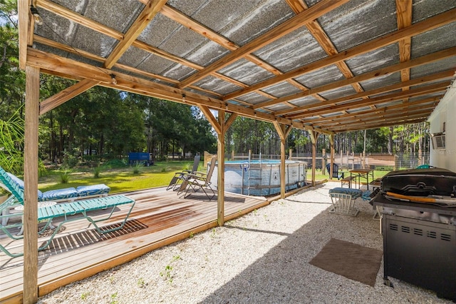 view of patio / terrace with a swimming pool side deck