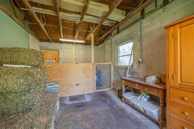 miscellaneous room with concrete flooring