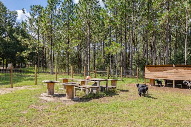 view of community featuring a yard