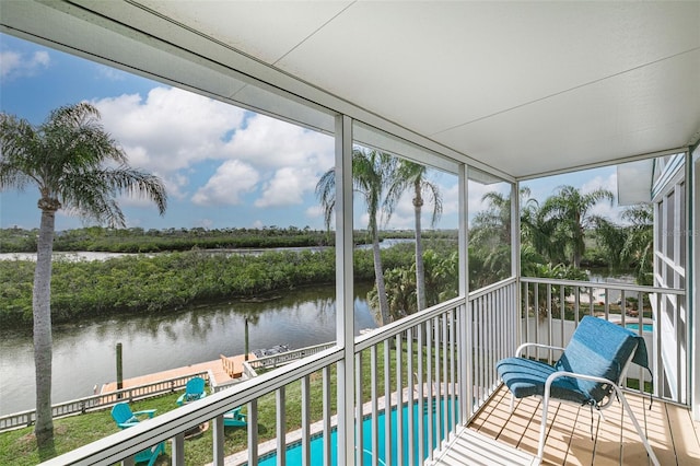 sunroom with a water view