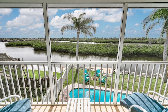 balcony featuring a water view