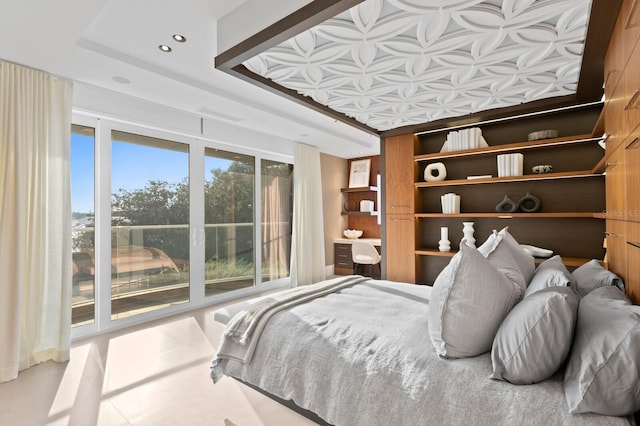 bedroom featuring a tray ceiling