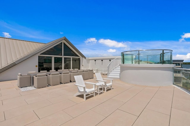 view of patio / terrace with a balcony