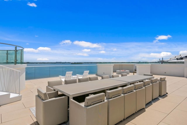 view of patio / terrace with a water view