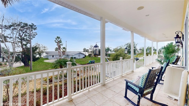 balcony featuring a porch