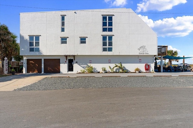 view of property featuring a garage