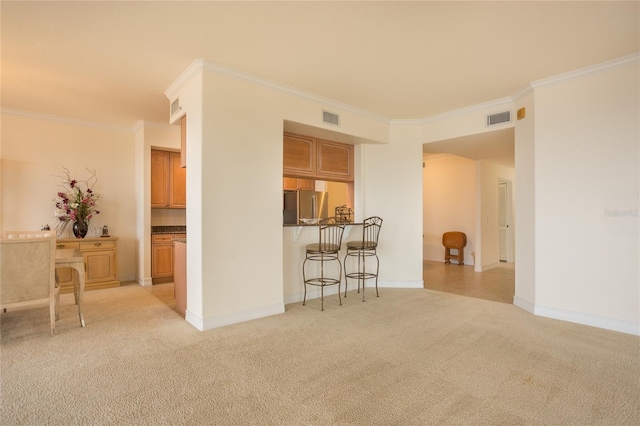 living room with light carpet and crown molding