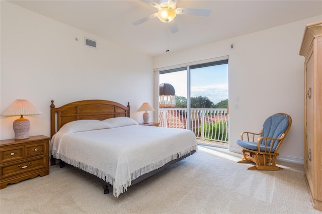 bedroom with ceiling fan, access to exterior, and light carpet