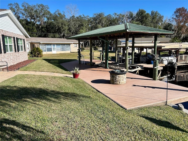 dock area featuring a gazebo and a lawn