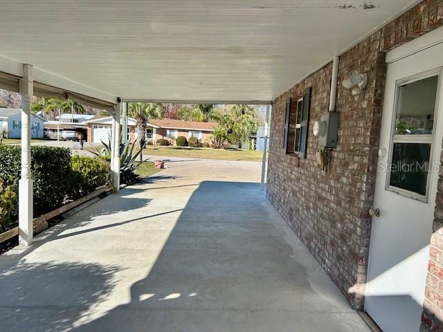 view of patio / terrace featuring a carport