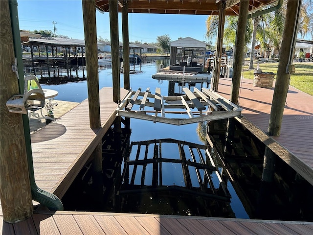 dock area featuring a water view