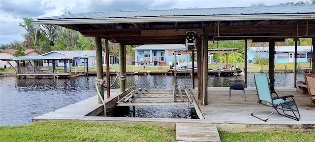 dock area featuring a water view