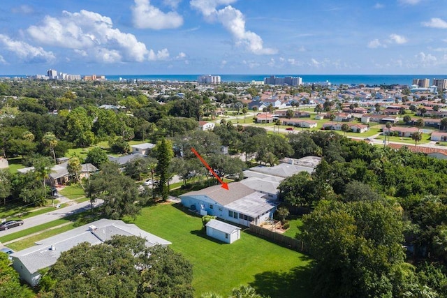 bird's eye view with a water view