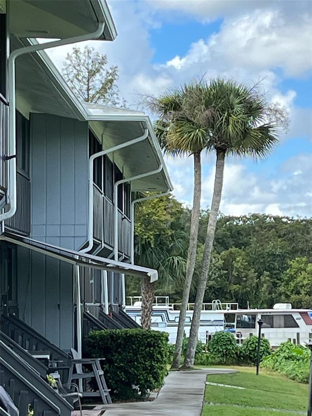 view of home's exterior featuring a yard