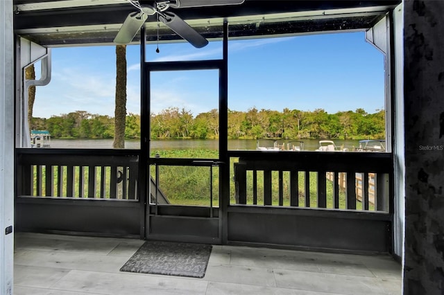 exterior space with a ceiling fan