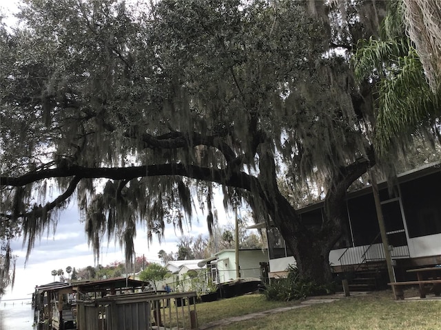 view of property exterior featuring a yard