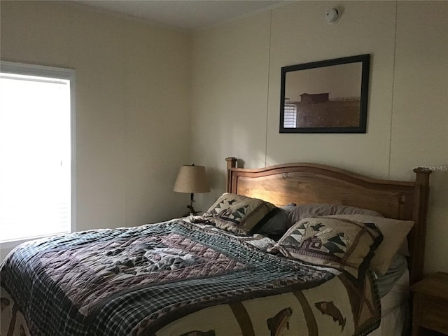 bedroom with multiple windows