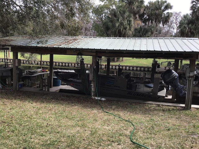 dock area featuring a lawn