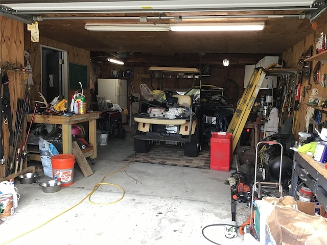 garage featuring white refrigerator