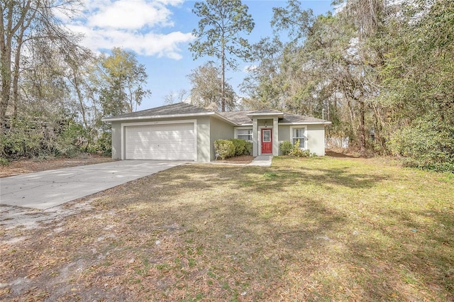 view of front facade featuring a front yard and a garage