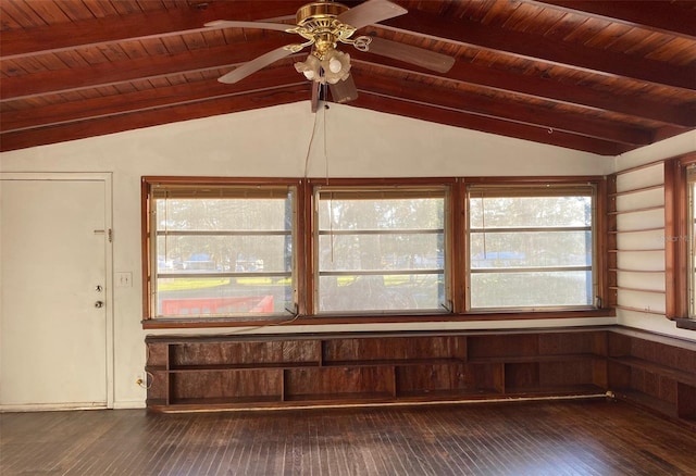 interior space featuring vaulted ceiling with beams, a wealth of natural light, and wooden ceiling