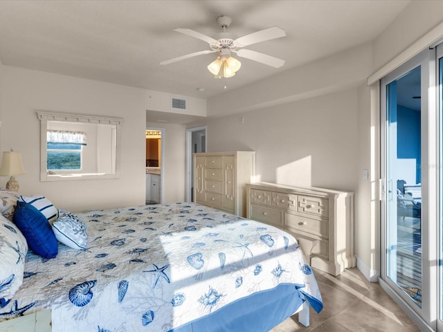 bedroom with ensuite bath, ceiling fan, and light tile flooring