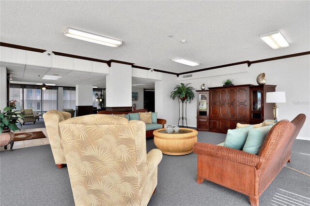 carpeted living room with a textured ceiling and ornamental molding