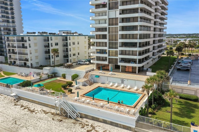 view of swimming pool featuring a patio area