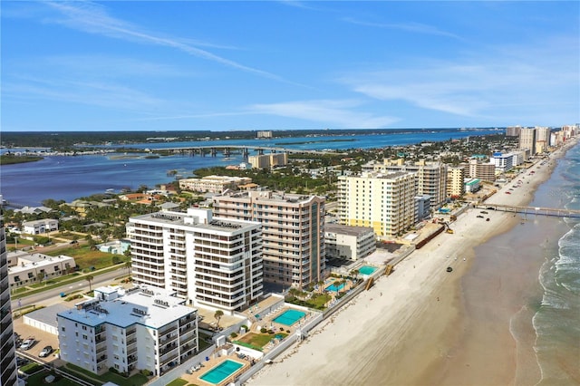 aerial view with a beach view and a water view