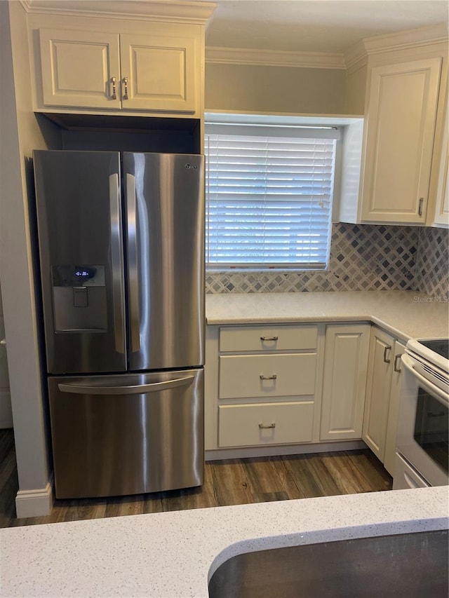 kitchen featuring hardwood / wood-style floors, light stone countertops, white electric range, tasteful backsplash, and stainless steel refrigerator with ice dispenser