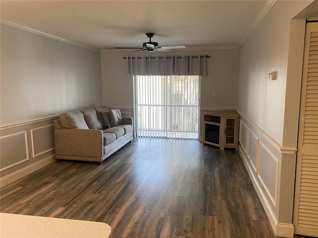 unfurnished living room with ceiling fan, dark hardwood / wood-style flooring, and ornamental molding