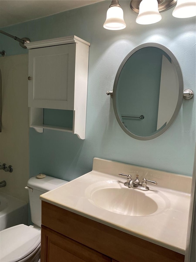 full bathroom featuring vanity, shower / bathtub combination, and toilet