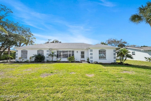 view of front facade with a front yard