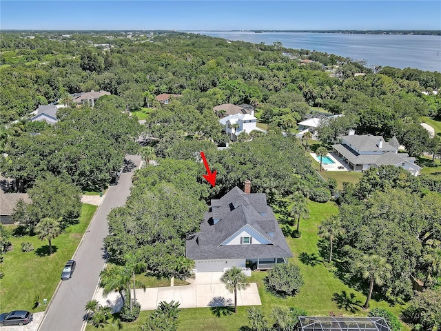 bird's eye view with a water view