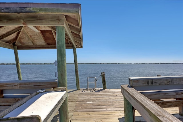 dock area featuring a water view