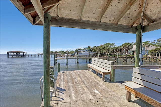 dock area featuring a water view