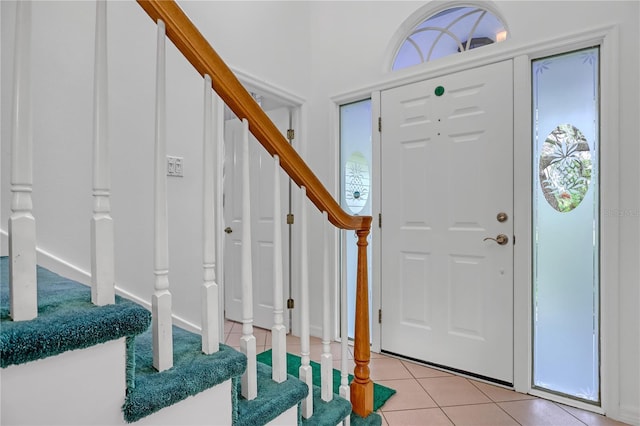 foyer with light tile patterned floors